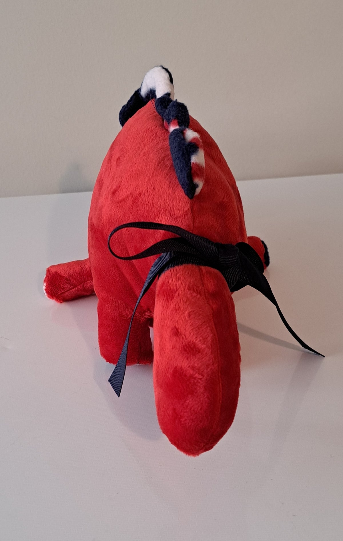 18-inch ed plush dino with patriotic crest, baby safe