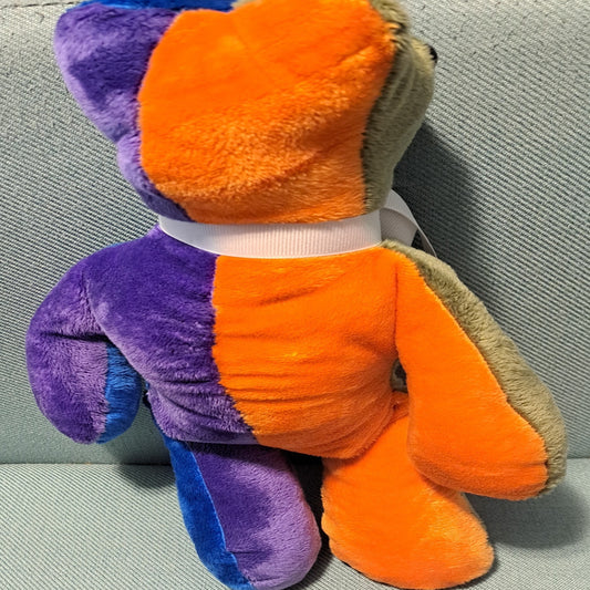 Back of patchwork bear, purple & orange,14" tall 10" across