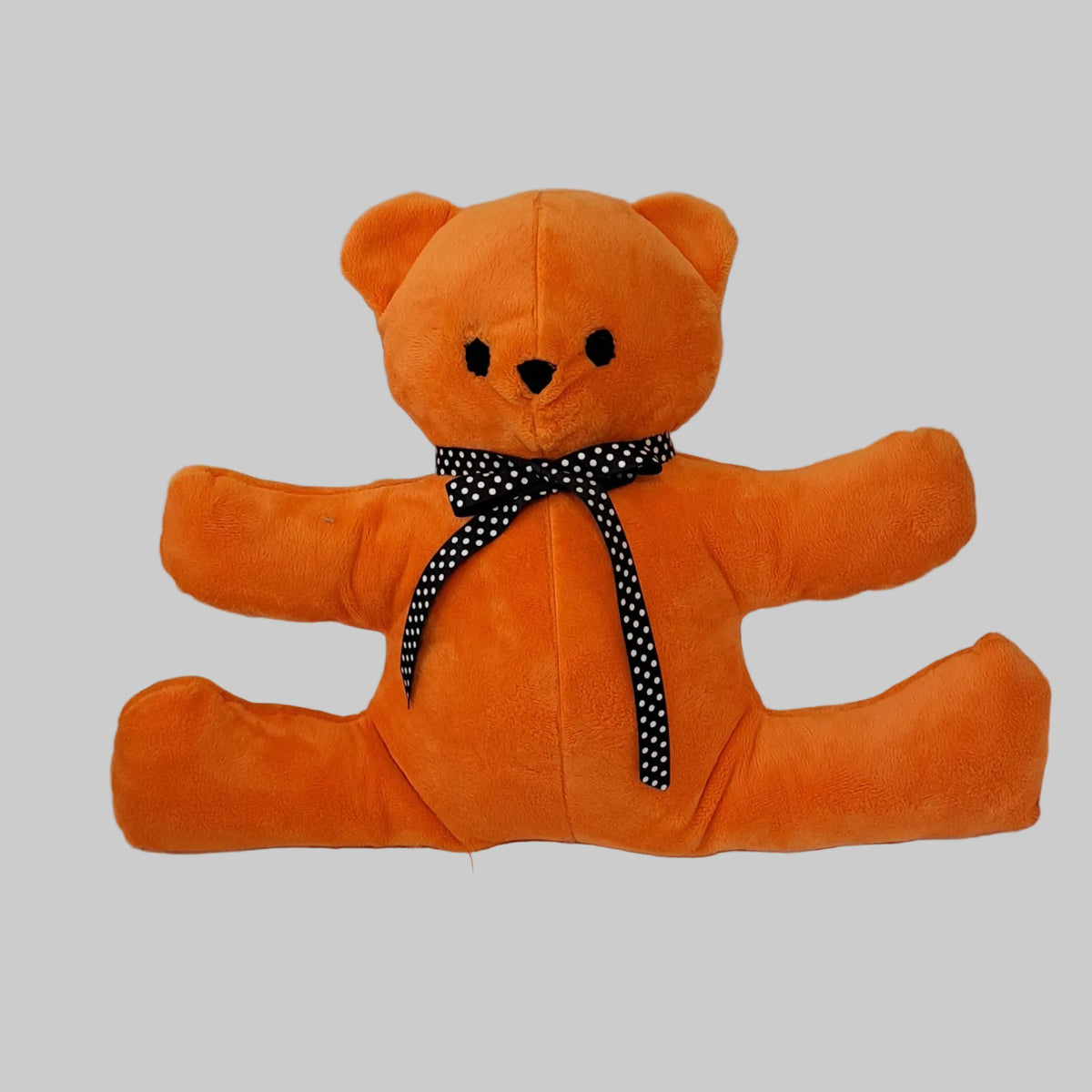 Orange minky plush sitting teddy with are outstretch to 17", black & white poke dotted ribbon embroidered eyes & nose, safe for all ages