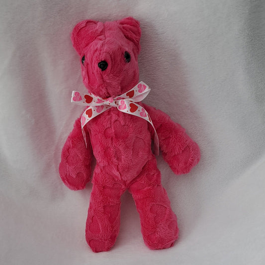 Stuffed embossed hearts pink bear, 14" tall x 10" across. plastic eyes & nose, 3+years