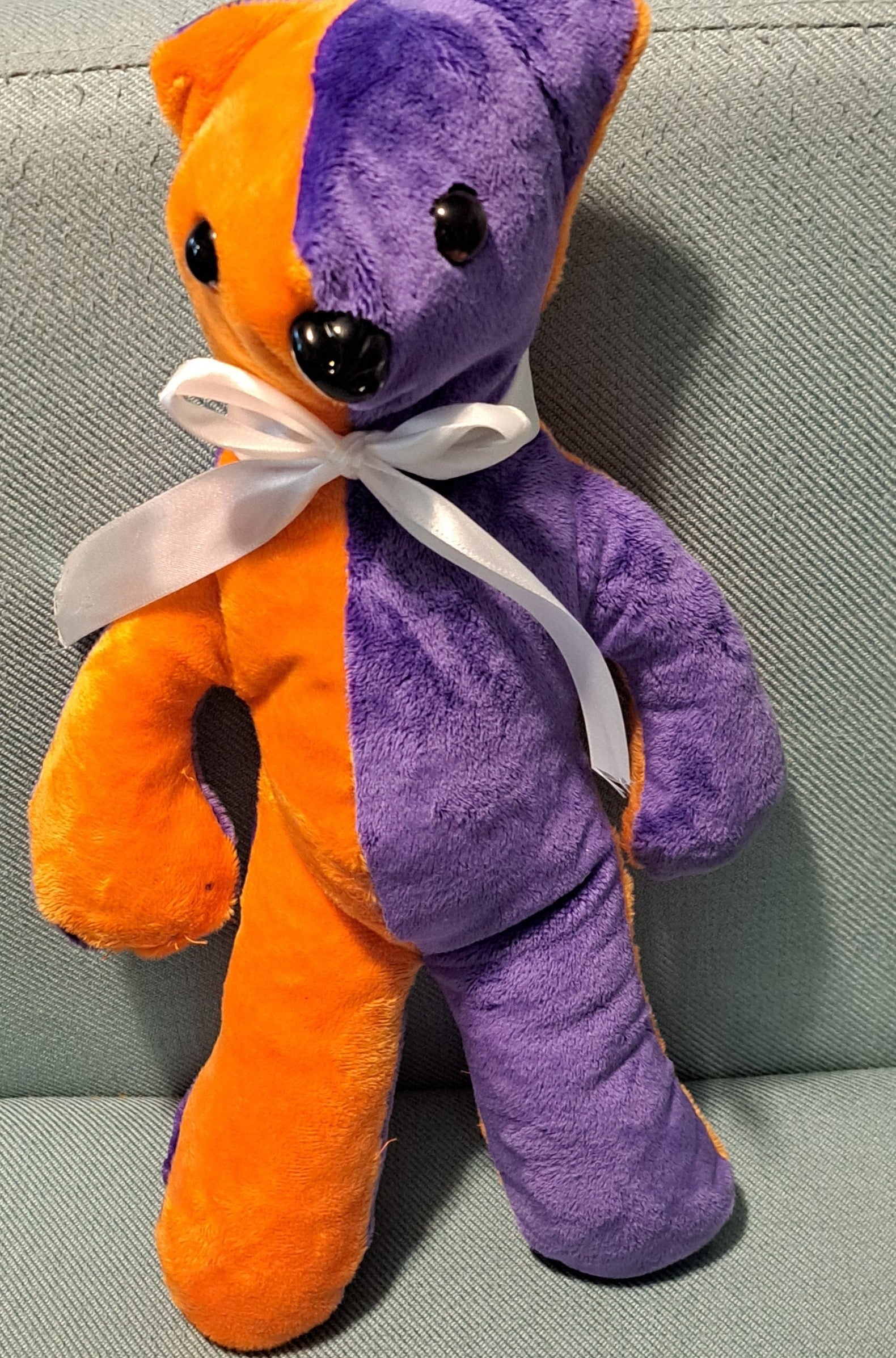14-inch-tall purple & orange plush patchwork bear, plastic eyes & nose, 3+yrs