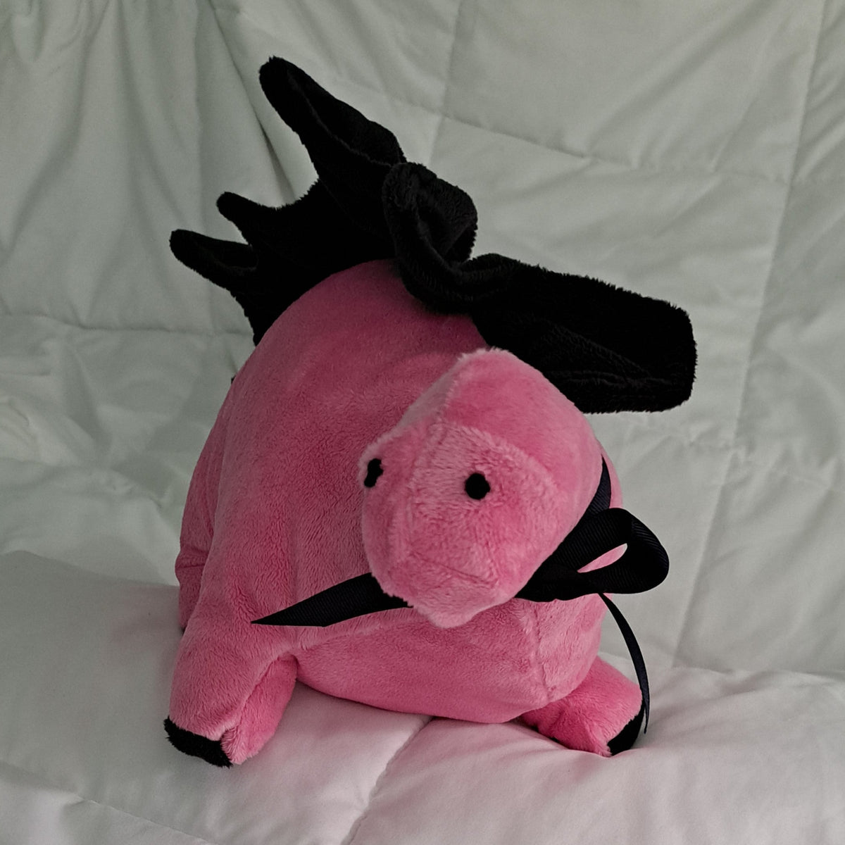 Pink minky plush 27" long dino with black crest, embroidered eyes, safe for all ages