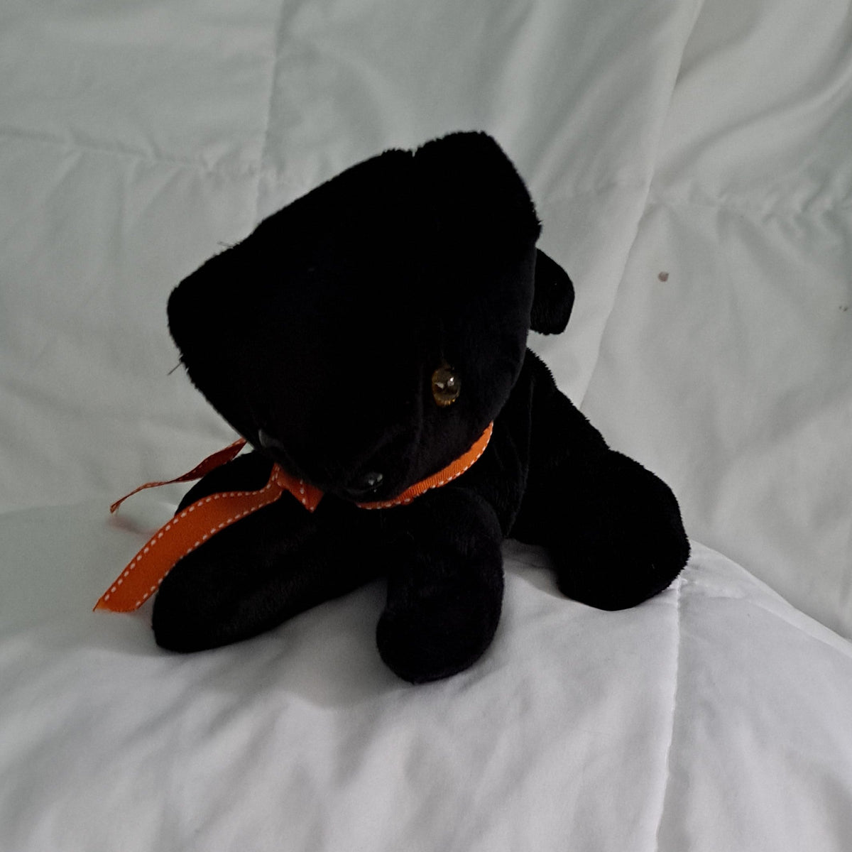Black minky plush 12"long x 7" tall kitten, plastic eyes & nose, suitable for 3+ years