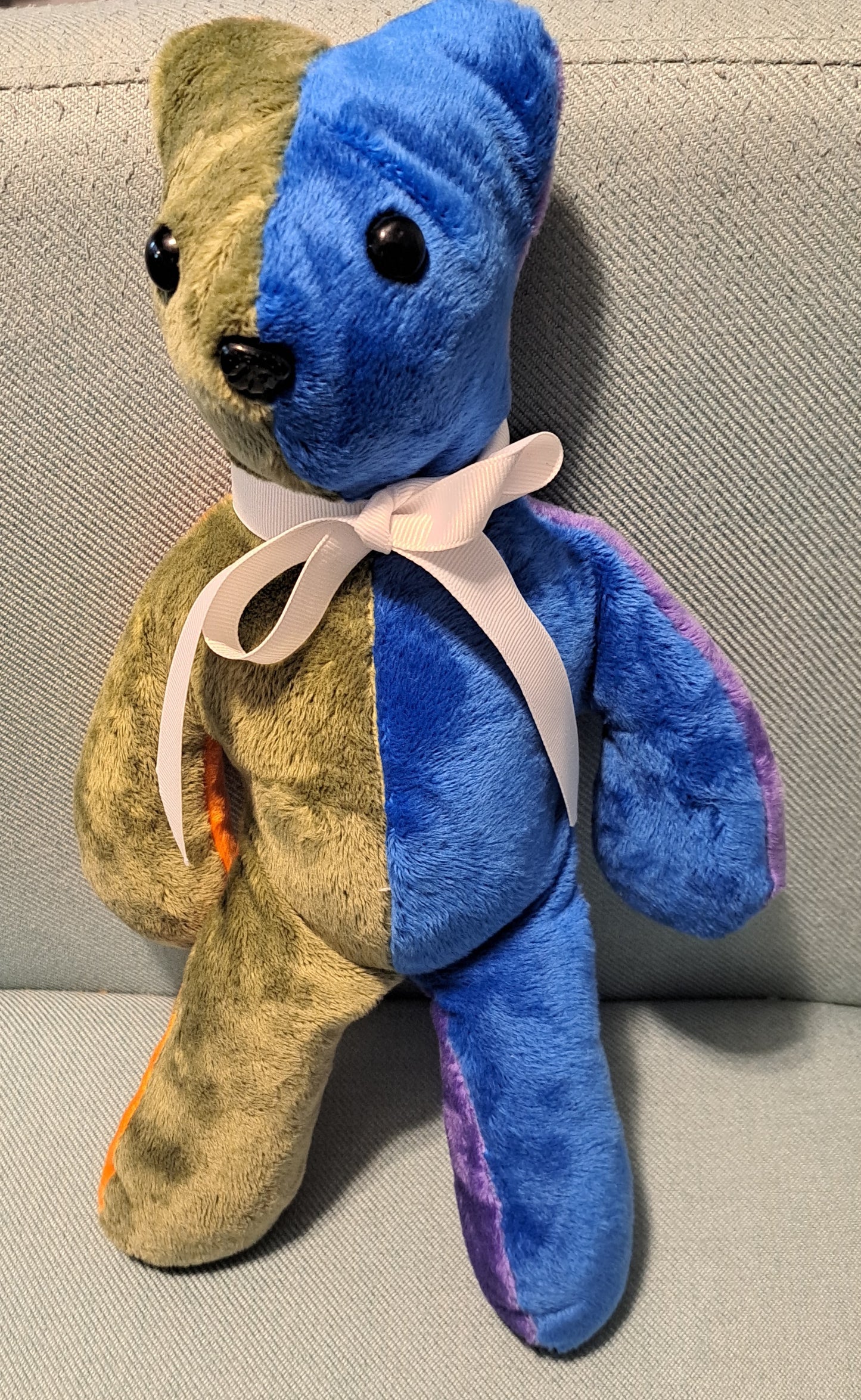 14-inch-tall patchwork plush bear, front blue & green, plastic eyes & noe, 3+yrs
